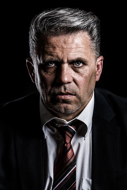 Professional sports coach, serious and inspiring demeanor